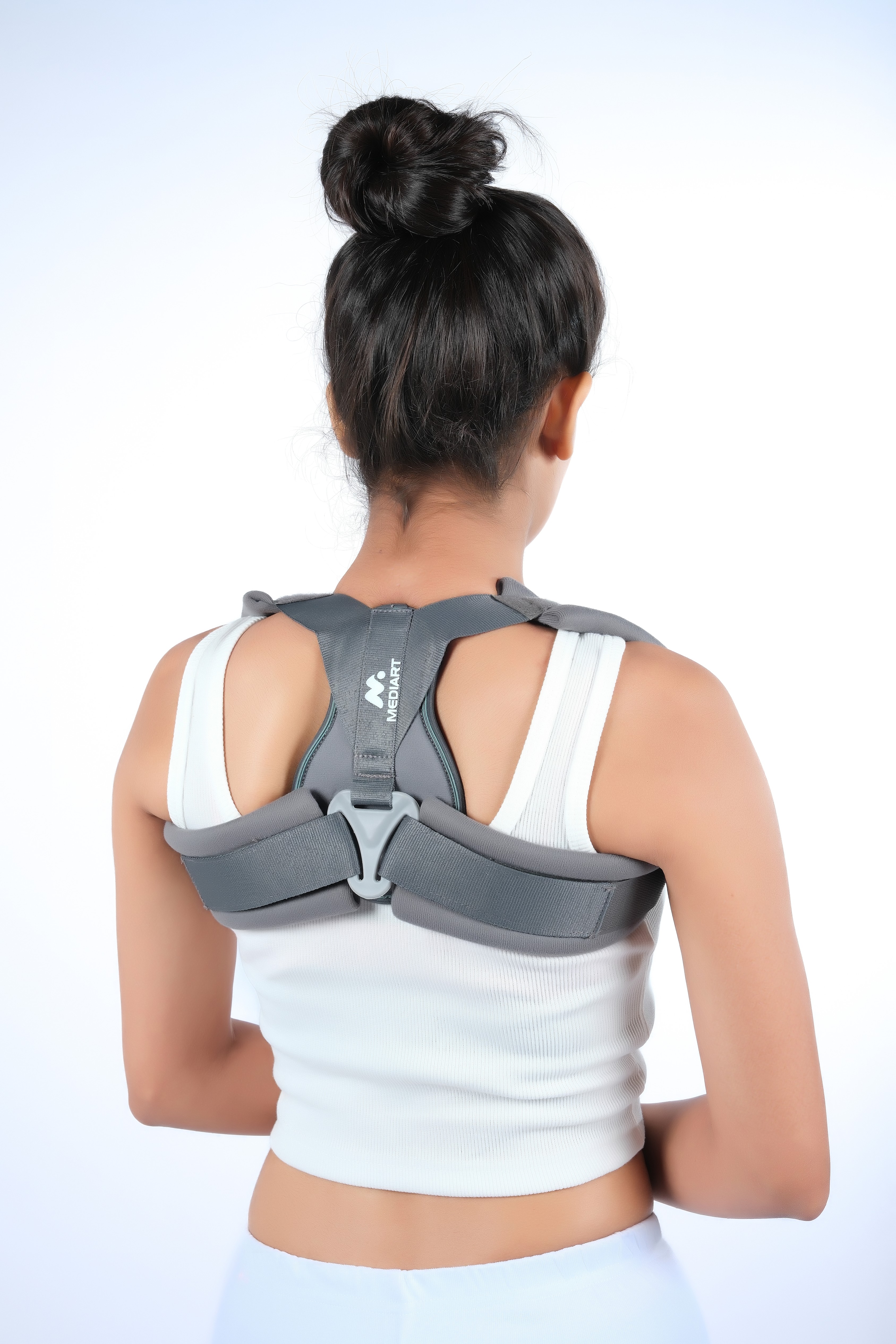 Clavicle brace with buckle